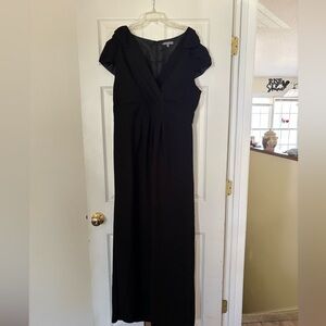 per una Black Maxi Jumpsuit. Cap Sleeves with bow detail.